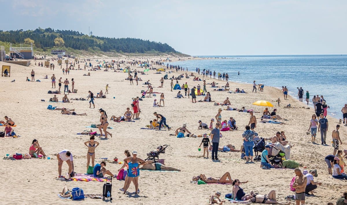 Sunny day at Palanga beach with visitors enjoying the seaside